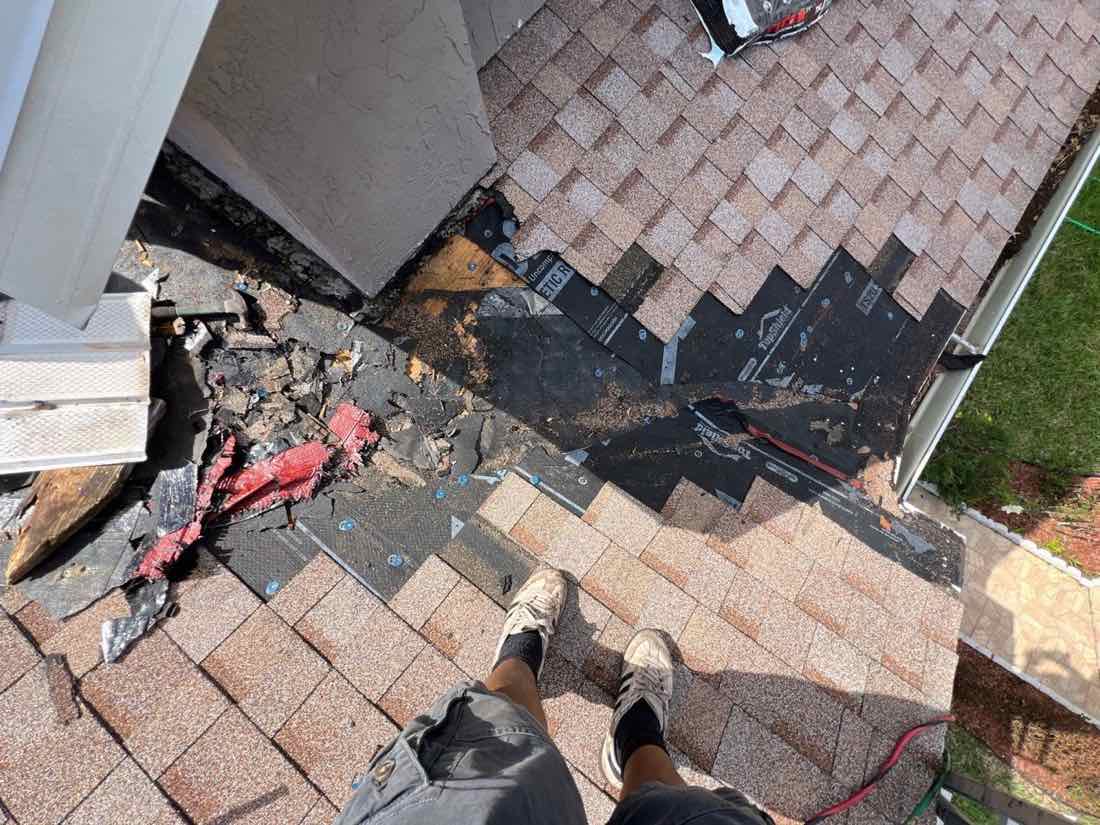 Rotted roof decking discovered and replaced